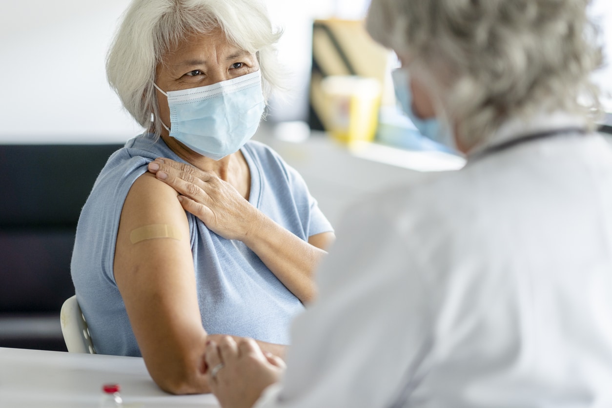 Senior Patient Successfully Receiving Her Flu Vaccination