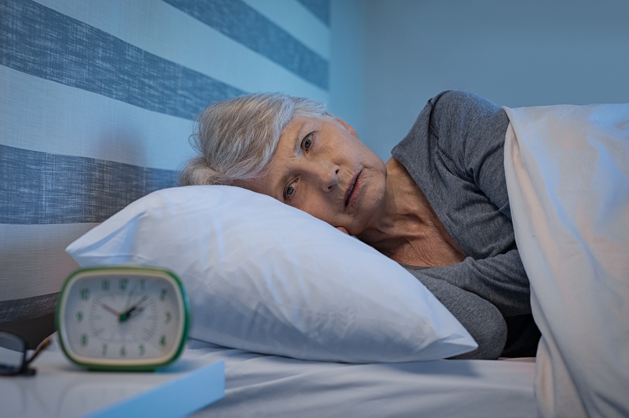 woman experiencing insomnia at night
