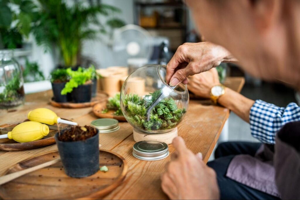 gardening-group-at-assisted-living-facility-creating-terrariums